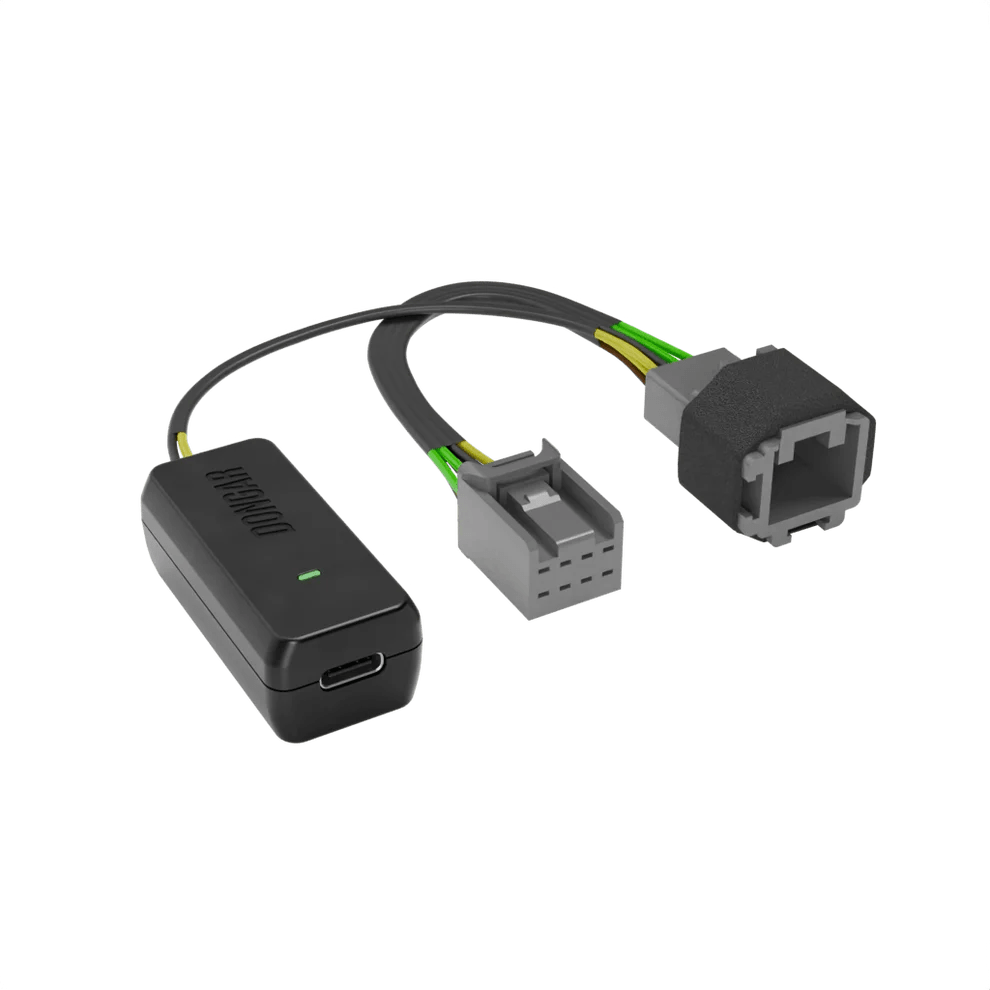 Matte black Dongar Classic adapter with USB-C port and textured rubberized male connector, showing multi-strand yellow and brown wires for robust mirror power