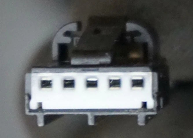 Mechanical component on a plain background