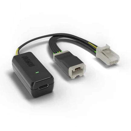 Dongar Classic adapter with USB-C port, lit green LED, and yellow green internal wires