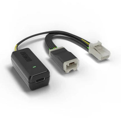 Dongar Classic adapter with USB-C port, lit green LED, and yellow green internal wires