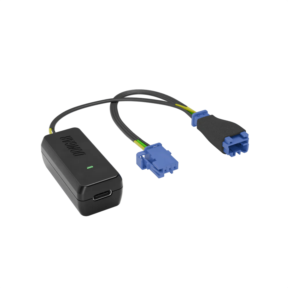 Dongar hardwire kit with blue automotive connectors and foam grip, showcasing yellow and green stranded wires for durable hidden dash cam power routing