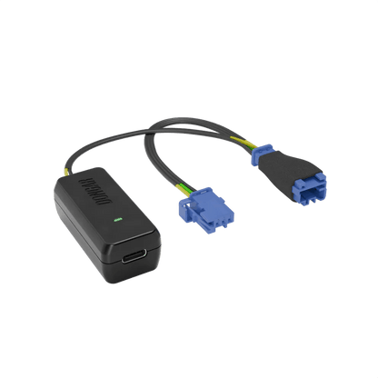Dongar hardwire kit with blue automotive connectors and foam grip, showcasing yellow and green stranded wires for durable hidden dash cam power routing