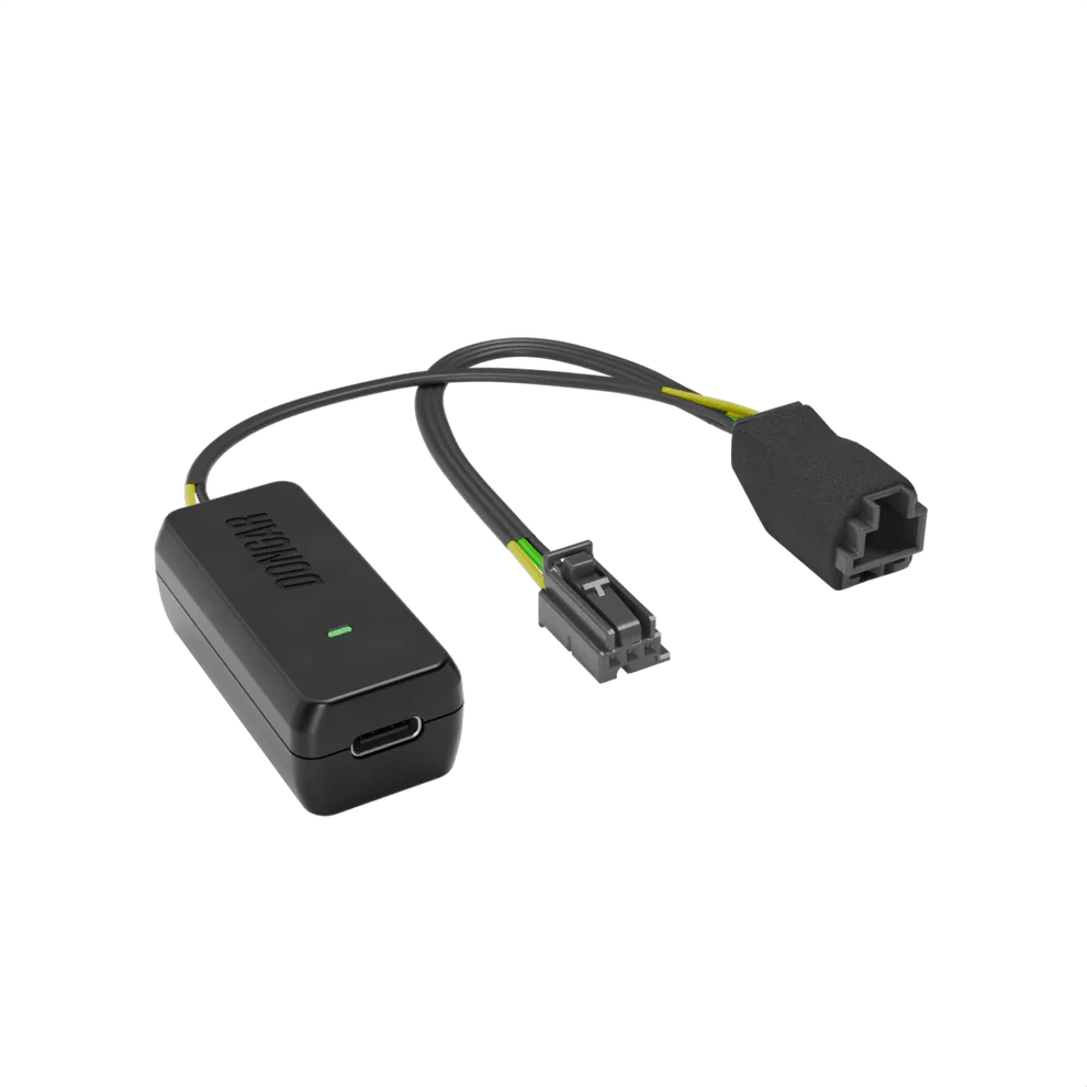 Dongar Classic black hardwire adapter with USB-C port and green LED, featuring gray multi-pin connector with yellow and green wires for hidden dash cam install