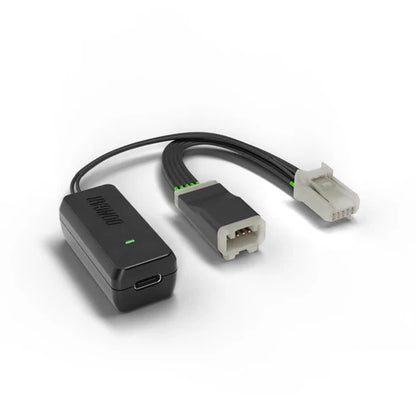 Dongar hardwire kit with USB-C port connecting to gray plastic multi-pin connector