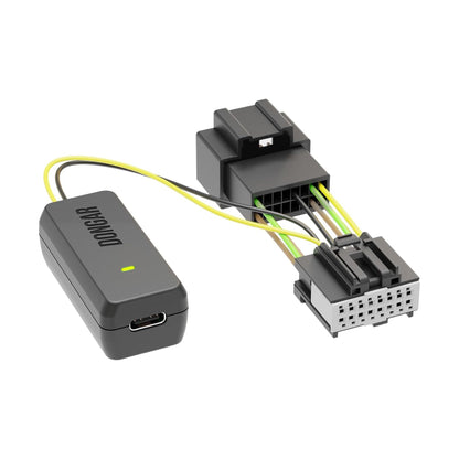 Dark gray Dongar adapter with USB-C port and yellow LED, connected to silver terminal block harness with brown and black internal wires for clean wiring