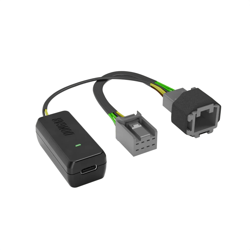 Matte black Dongar Classic adapter with USB-C port and textured rubberized male connector, showing multi-strand yellow and brown wires for robust mirror power