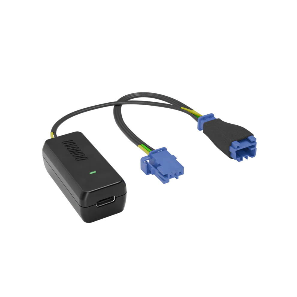 Dongar hardwire kit with blue automotive connectors and foam grip, showcasing yellow and green stranded wires for durable hidden dash cam power routing