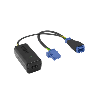 Dongar hardwire kit with blue automotive connectors and foam grip, showcasing yellow and green stranded wires for durable hidden dash cam power routing