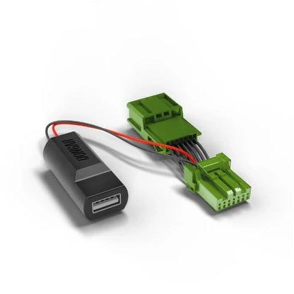 Dongar hardwire adapter with USB-A port and red black wires leading to green plastic connectors