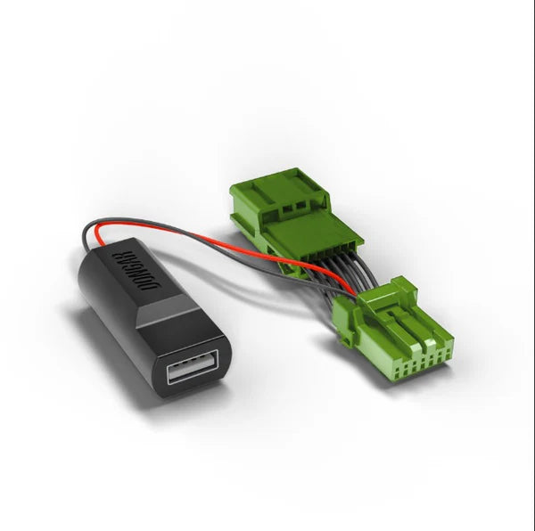 USB adapter with green connectors on a white background