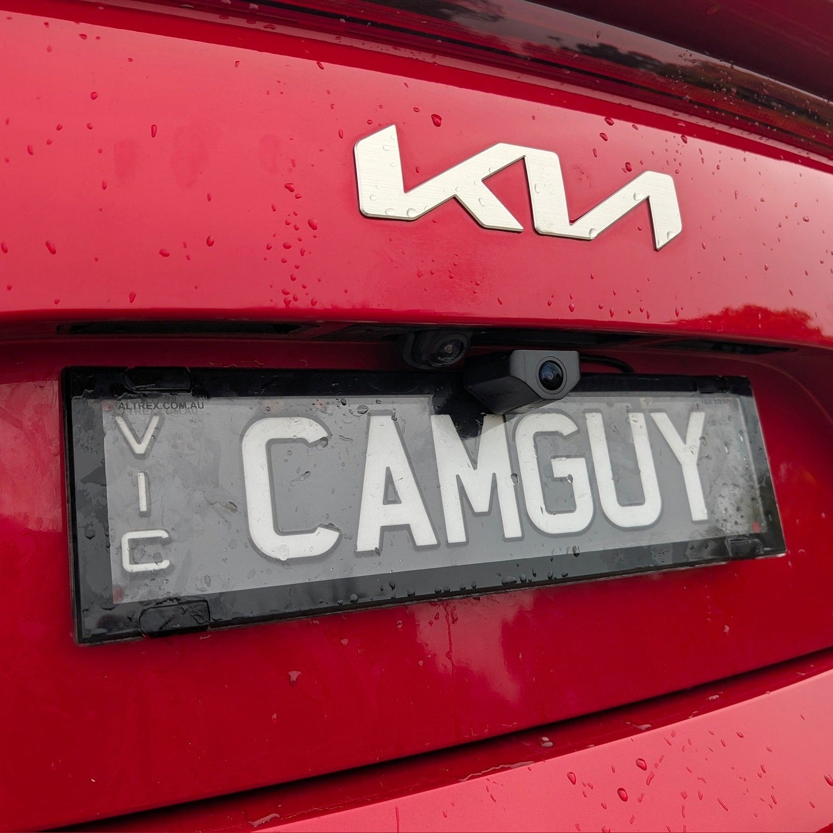 Rear view of Wolfbox camera bracket holding Aussie number plate