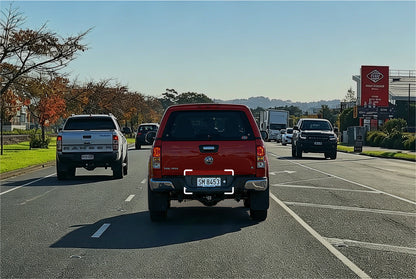 VIOFO T330T dash cam high-resolution capture of distant vehicle license plate in traffic