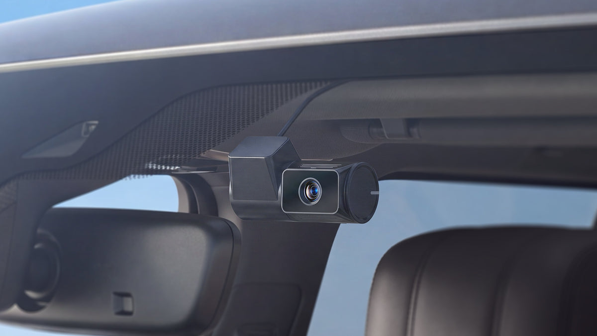 VIOFO T340TW black cabin camera module mounted near rearview mirror