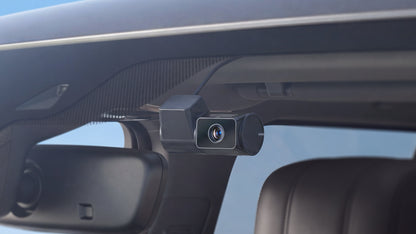 VIOFO T340TW black cabin camera module mounted near rearview mirror