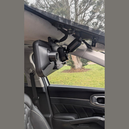 WOLFBOX dash cam installed on gray OEM mirror bracket inside vehicle with routed wiring