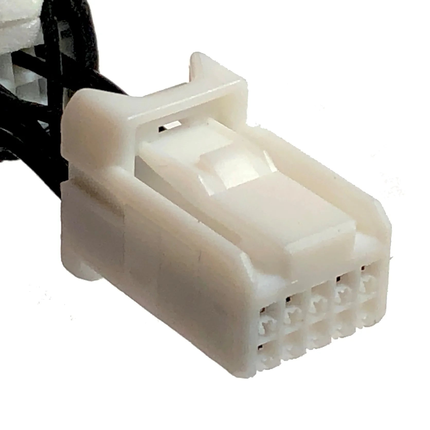 Close-up of a white automotive wiring connector on a white background