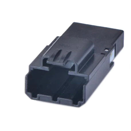 Black plastic component on a white background